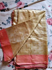 Elegant Gold Saree with Pink Border