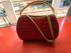 Elegant Red Embellished Handbag