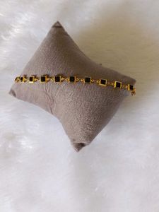 Elegant Bracelet with Black Stone Details