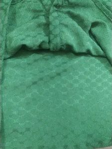 Charming Green Textured top with Bow