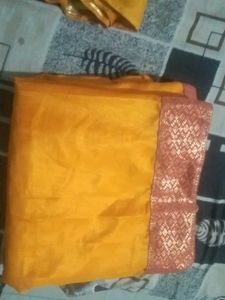 Vibrant Yellow Saree with Ornate Border
