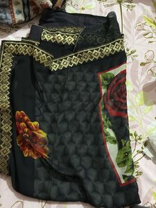 Elegant Black Saree with Gold Border