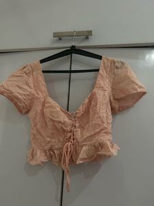Chic Lace-Up Peplum Top