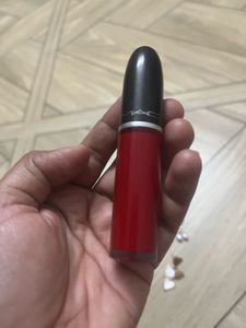 MAC Lipstick, eyeliner and earrings