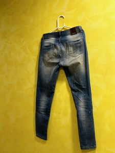 Distressed Blue Jeans with Paint Splatter