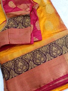 Vibrant Yellow Saree with Brocade Blouse