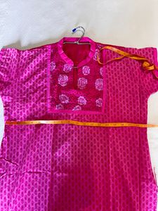 Vibrant Pink Kurti with Floral Accent