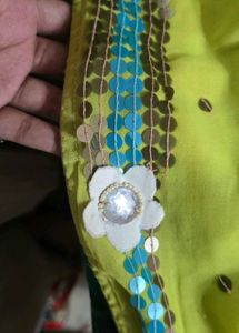 green saree is very beautyful and flower