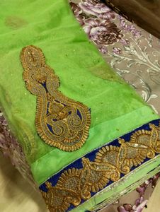 Elegant Green Saree with Embellishments