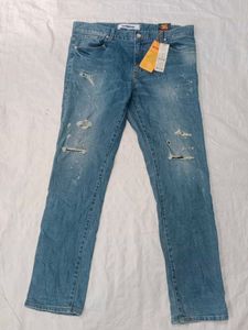 Distressed Denim Jeans