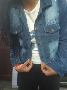 Stylish Blue Denim Jacket with white top and beige