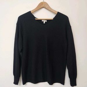 A Black Full Sleeved Top for Women .