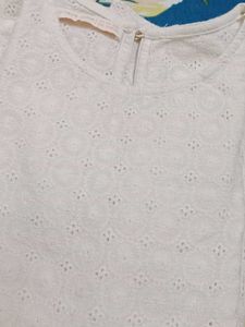 Elegant White Embroidered Peplum Top