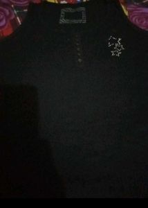 Black Tank Top with Star Embellishments