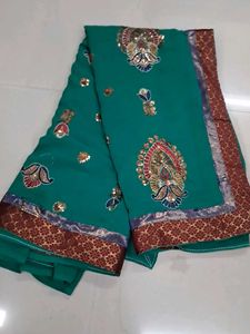 Stunning Teal Embroidered Saree