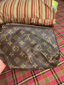 Louis Vuitton pouch Authenticity Not Verified