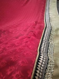 Elegant Red Saree with Embellished Border