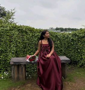 Elegant Maroon Gown with Bow Detail