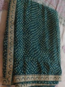 Beautiful Teal Saree with Golden Border