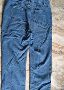 Distressed Blue Denim Jeans