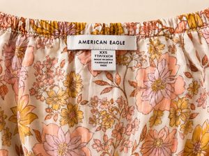 Floral Wrap Peplum Top