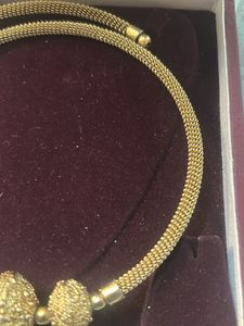 Elegant Gold Necklace with Textured Beads