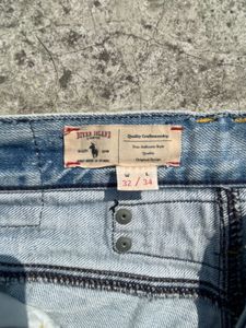 Distressed Light Wash Flare Jeans