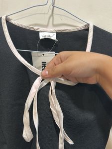 Black cropped top with tie detail