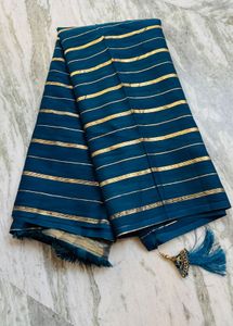 Elegant Teal Saree with Golden Stripes