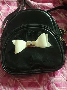 Black Backpack with Bow