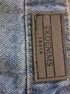 ripped denim mom jeans