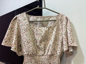 Chic Floral Smocked Peplum Top