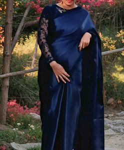 black saree with stiched blouse.