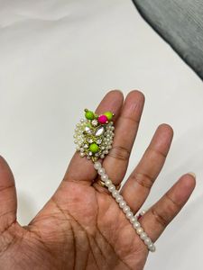 Pearl bracelet with attached ring