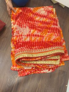 Vibrant Tie-Dye Saree with Golden Border