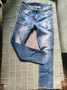 Light Blue Distressed Denim Jeans