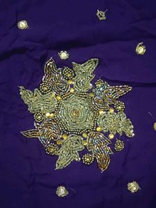 Stunning Embroidered Purple Saree