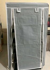 Grey Fabric Wardrobe with vast iron base
