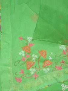 Beautiful Green Saree with Floral Embellishments
