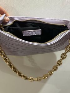 Animal print shoulder bag with chain