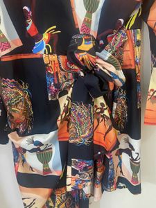 Vibrant Print Mini Dress with Belt style