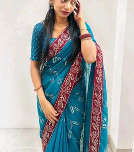 Beautiful Teal Saree with Red Border