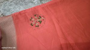 Elegant Orange Saree with Tassels