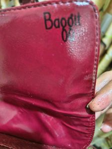 Stylish Baggit Brand maroon colour Crossbody Bag