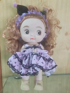 Cute Doll with Purple Dress