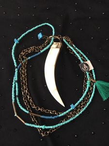 ivory tooth and Turquoise beads Necklace.
