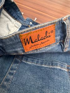 Ripped Flare Jeans