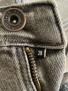 Grey Flare Jeans with Distressed Details
