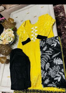 Vibrant Yellow Kurta Set with Black Trousers