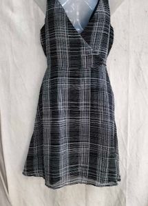4829. Chic Black &amp; White Plaid Wrap Dress